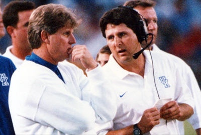 Mike Leach talking to Hal Mumme